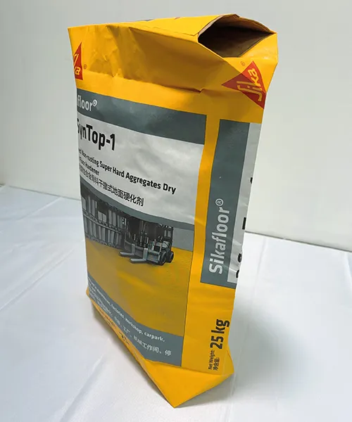 Sac à valve auto-obturant utilisé pour le conditionnement de granulats.